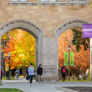 Students walk through the Arches on a beautiful fall day on October 24, 2019, in St. Paul.