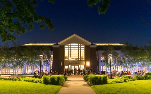 The Ruth Stricker Dayton Campus Center at night on the Macalester College campus.