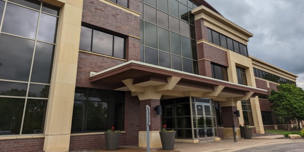 A photo of the front of the Grand Oak Business Park building, Eagan, MN